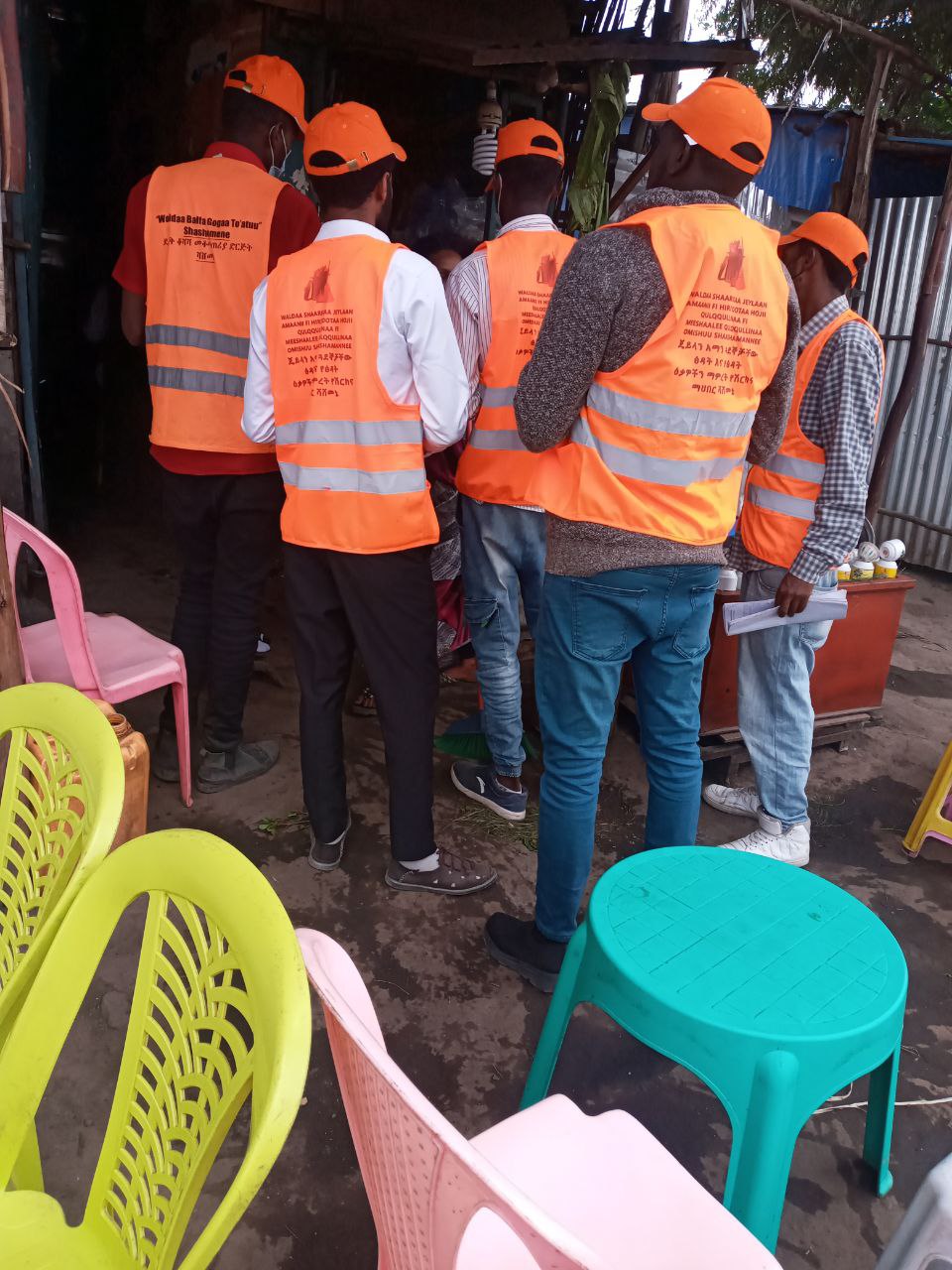 Field workers engaging with community members