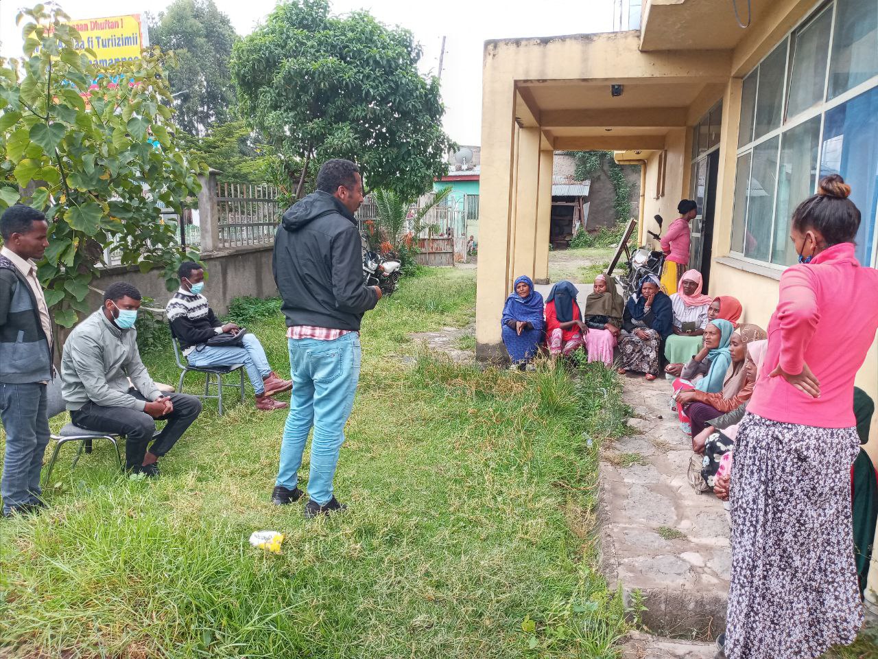 Community awareness meeting in the field